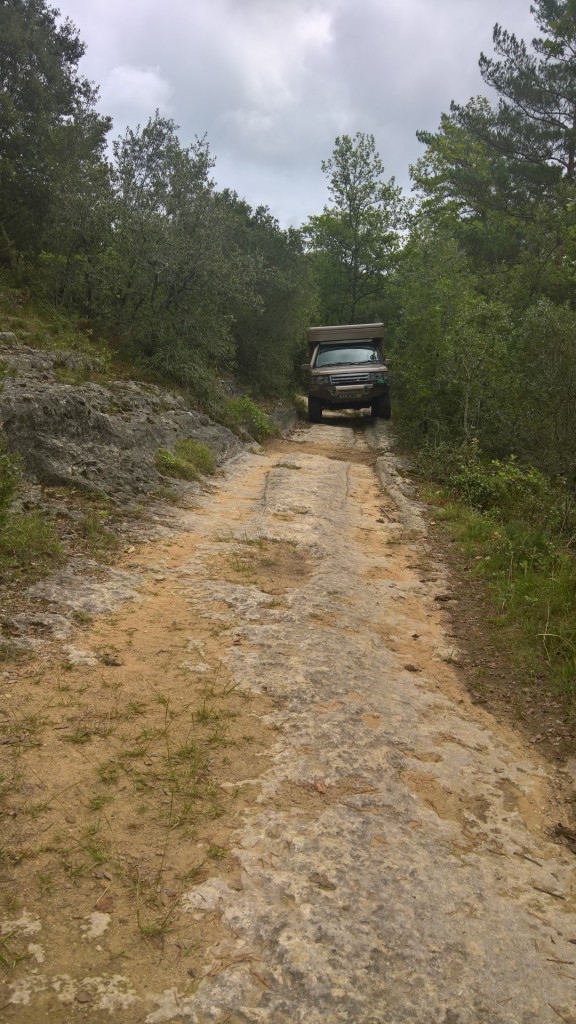 Range rover camper green laning on tracks in the France