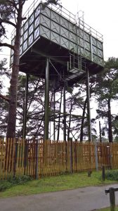 WW" steel water tower in Hampshire campsite UK