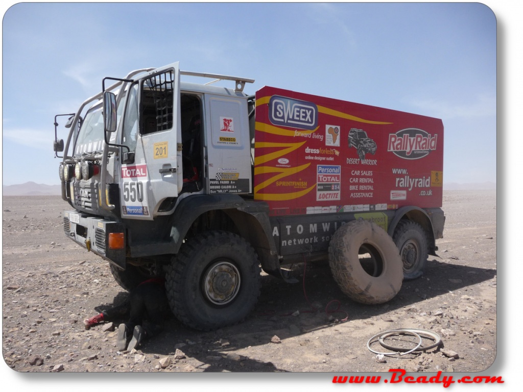 careful underneath the dakar race truck and expedition camper overland beady