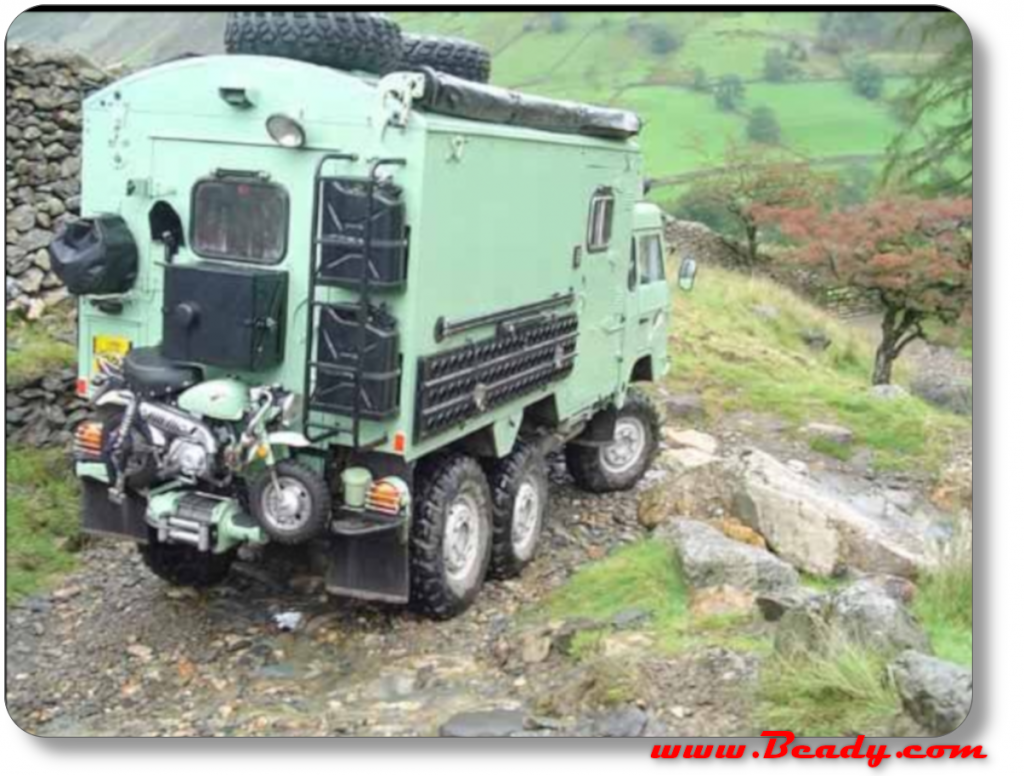 6x6 overland truck in trouble on simple corner, off road