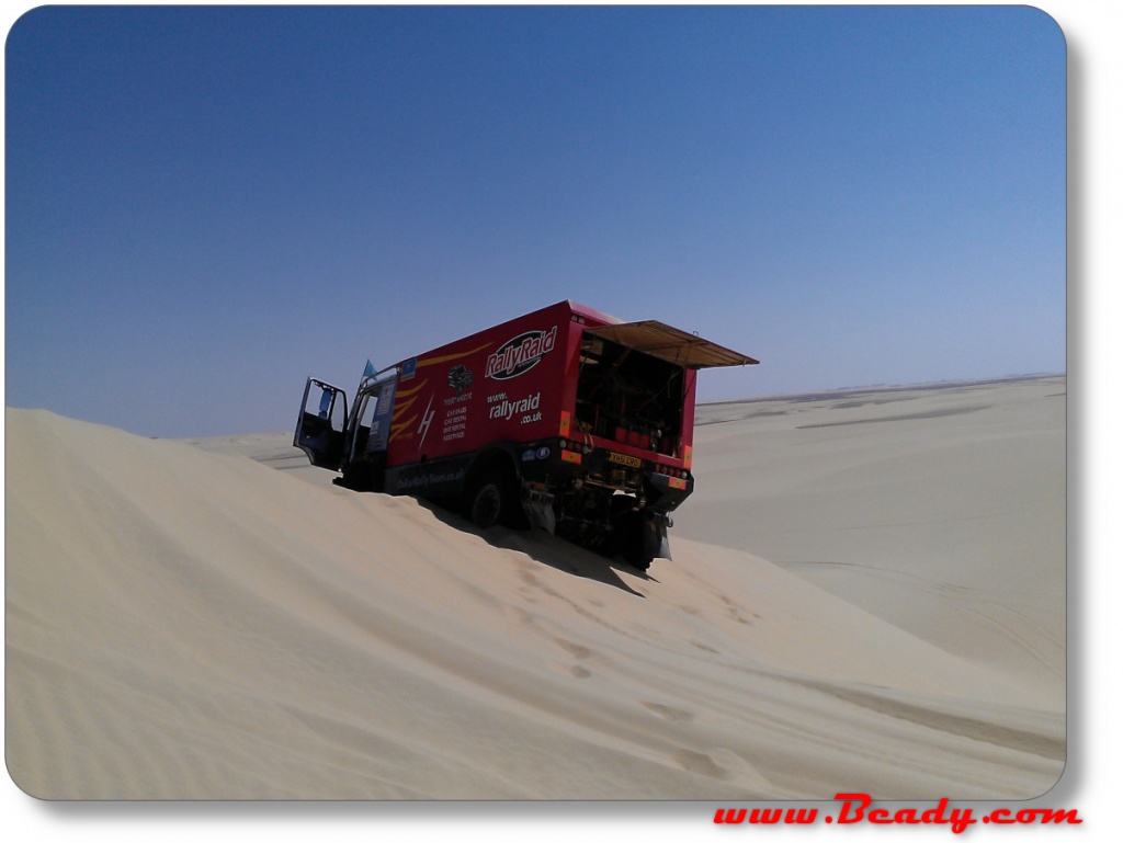 dakar rally truck stuck on dune