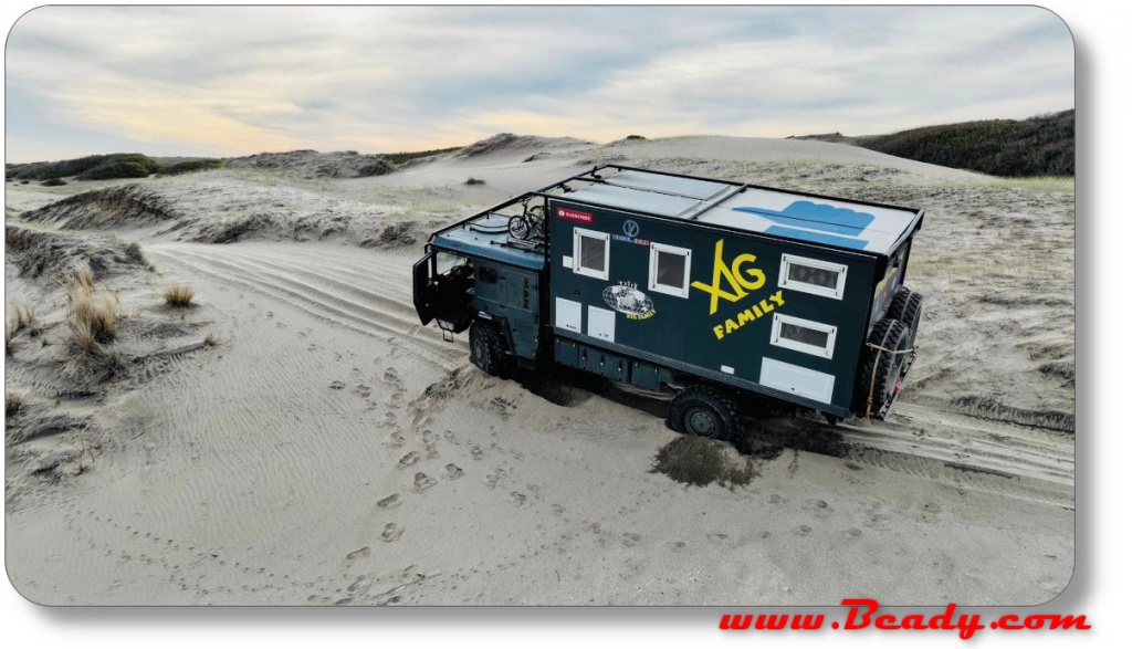 overland truck stuck on beach