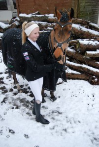 Chloe modeling her new specially designed showjumping jacket part of Team Hamzantine Equine