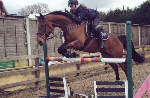 Chloe and Crystal on Saturday at home schooling, She's wearing her new KEP hat and saddle cloth from Equestrian world. There is a link on the right to the webpage.