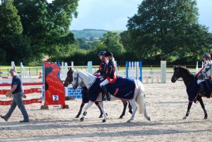 Chloe and Cloughroe Lady Jane jumping double clear for the England 138cm team winning gold