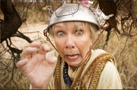 crazy woman with collander on her head