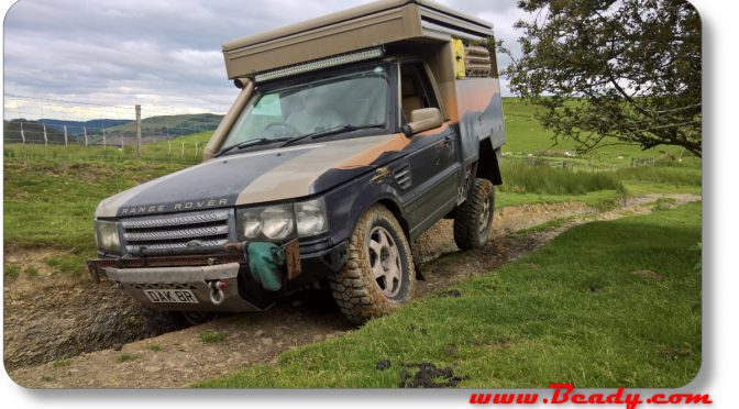 Range rover under extreme cross axle in Wales